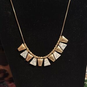Elegant Gold and White Necklace